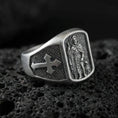 Load image into Gallery viewer, Oxidized 925 sterling silver Saint Roch signet ring on volcanic rock, patron saint relief with dog figure, cross shoulder details