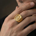 Load image into Gallery viewer, Gold plated Saint Roch signet ring worn on finger, patron saint of healing and protection, bold signet style with cross sides
