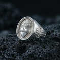 Load image into Gallery viewer, Polished silver Sacred Heart signet ring on porous volcanic stone, engraved flaming heart with crown of thorns, bold faith symbol ring