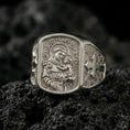 Load image into Gallery viewer, Polished silver Saint Anthony signet ring on porous volcanic stone, detailed saint relief and cross sides, Christian faith ring