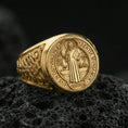 Load image into Gallery viewer, Gold plated St Benedict signet ring on dark volcanic rock, Benedict medal seal with Latin text, Catholic religious gift ring