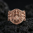Load image into Gallery viewer, Rose gold plated heraldic cross shield ring on volcanic stone, shield-shaped face with fleur-de-lis cross and vintage scroll details