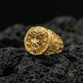 Load image into Gallery viewer, Gold plated Jesus ring on dark volcanic rock, crown of thorns portrait signet with warm tone and crisp sculpted depth