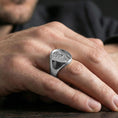 Load image into Gallery viewer, Polished silver Pope portrait ring worn on finger, papal profile relief with smooth bezel signet