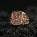 Load image into Gallery viewer, Rose gold plated Saint Andrew signet ring on dark volcanic stone, apostle relief with cross motif side detail