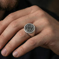 Load image into Gallery viewer, Oxidized Masonic signet ring worn on a finger, close-up lifestyle photo highlighting the engraved motto and square compass emblem