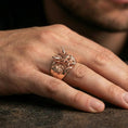Load image into Gallery viewer, Rose gold plated Oni mask ring on the finger, close-up lifestyle photo showcasing the horned samurai demon design and sculpted depth