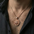 Load image into Gallery viewer, Rose gold plated guardian lion medallion necklace worn on neck, lifestyle wear shot, warm plating tone and sculpted depth