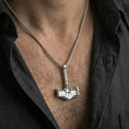 Load image into Gallery viewer, Polished silver Thor hammer necklace worn on neck, clean lifestyle framing, reflective finish and crisp engravings