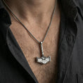 Load image into Gallery viewer, Oxidized Mjolnir Thor hammer necklace worn on neck, lifestyle close-up, pendant centered with braided chain