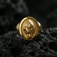 Load image into Gallery viewer, Gold plated gorilla head signet ring on volcanic rock, premium studio scene, fierce animal motif with bold relief detail