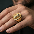Load image into Gallery viewer, Gold plated gorilla warrior signet ring worn on finger, premium styling, statement signet ring as focal point on hand