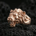 Load image into Gallery viewer, Rose gold plated angry lion king ring on volcanic rock, dramatic mane carving and open-jaw lion detail, luxury product close-up