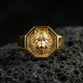 Load image into Gallery viewer, Gold plated wolf signet ring on volcanic rock, octagonal wolf crest ring with high-relief fur texture and recessed dark field, premium studio lighting