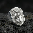 Load image into Gallery viewer, Polished silver tiger signet ring on volcanic rock, shield crest design with detailed tiger stripes and crisp beveled border, premium close-up shot