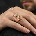 Load image into Gallery viewer, Rose gold plated oni mask ring on the finger, macro lifestyle image focusing on the sculpted horns and fierce expression