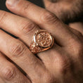 Load image into Gallery viewer, Rose gold plated Saint Peter Keys of Heaven ring worn on a finger, macro lifestyle photo showcasing the detailed religious emblem