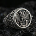 Load image into Gallery viewer, Sterling silver Masonic ring with an oxidized finish, double-headed eagle emblem and “32” triangle detail, macro on black volcanic rock