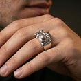 Load image into Gallery viewer, Polished silver finish camera ring on the finger, macro lifestyle image focusing on the raised camera body, lens, and dial details