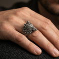 Load image into Gallery viewer, Oxidized wolf head ring worn on finger, rugged masculine look with detailed wolf sculpture