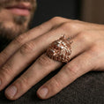 Load image into Gallery viewer, Rose gold plated lion head ring on finger, close-up lifestyle photo showcasing the crown, roaring expression, and detailed mane engraving