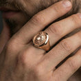 Load image into Gallery viewer, Rose Gold plated wolf signet ring worn on finger, bold Nordic animal jewelry look