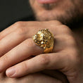Load image into Gallery viewer, Gold plated bulldog head ring worn on finger, lifestyle wear shot emphasizing the strong canine expression and engraved fur texture