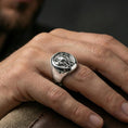 Load image into Gallery viewer, Polished silver elephant ring on finger, natural hand pose highlighting the raised elephant portrait and smooth oval bezel edges