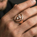 Load image into Gallery viewer, Rose gold plated leopard ring on finger, close-up lifestyle photo showcasing the detailed leopard portrait and classic signet silhouette