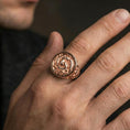 Load image into Gallery viewer, Rose gold plated yin yang koi ring worn on a finger, macro shot focused on the koi fish and texture