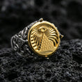 Load image into Gallery viewer, Sterling silver all-seeing eye pyramid signet ring with an oxidized body and gold plated front, engraved radiant eye and brick pyramid motif, macro on black volcanic rock