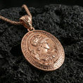 Load image into Gallery viewer, Rose gold plated Athena coin pendant necklace on textured volcanic rock, centered studio-style close-up showcasing soft rosy glow and intricate ancient Greek goddess engraving.