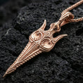 Load image into Gallery viewer, Rose gold plated Gungnir spear pendant necklace on textured volcanic rock, centered studio-style close-up showcasing soft rosy glow and the engraved spear motif with refined edges.