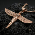 Load image into Gallery viewer, Rose gold plated winged Isis goddess pendant necklace on textured volcanic rock, centered studio-style close-up showcasing soft rosy glow and intricate Egyptian-inspired wing detailing.