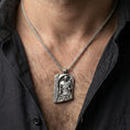 Load image into Gallery viewer, Oxidized Norse moon god pendant necklace worn on the neck, lifestyle framing showing realistic scale and bold vintage contrast against the chest.