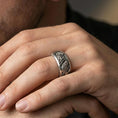 Load image into Gallery viewer, Oxidized koi fish and lotus band ring worn on a finger, lifestyle framing showing realistic scale and bold vintage contrast in a natural hand pose.