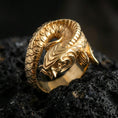 Load image into Gallery viewer, Gold plated koi fish wrap ring on volcanic stone, premium macro close-up showcasing warm gold tone across the koi head and scaled coils.