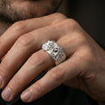 Load image into Gallery viewer, Polished silver lion head ring worn on the finger, lifestyle shot highlighting bright shine, strong lion symbolism, and everyday wear comfort.
