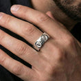 Load image into Gallery viewer, Polished silver Greek sculpture ring worn on the finger, lifestyle shot showcasing sleek shine, classical art styling, and everyday statement appeal.