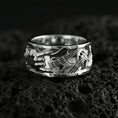 Load image into Gallery viewer, Polished silver guitar ring on volcanic stone, sharp macro shot emphasizing clean reflections, crisp instrument lines, and premium sculpted depth.