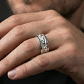 Load image into Gallery viewer, Polished silver horse band ring worn on the finger, lifestyle photo presenting a sleek shine and clear horse detailing for everyday Western-inspired wear.