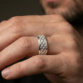 Load image into Gallery viewer, Polished silver geometric lattice ring on finger, crisp diamond grid engraving, refined everyday wear close-up.