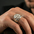 Load image into Gallery viewer, Polished silver nautical anchor ring worn on the finger, wearable photo emphasizing clean highlights and detailed sea texture