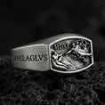 Load image into Gallery viewer, Oxidized sterling silver Archangel Michael ring with MDXI engraving and battle relief panel, macro product photo on black volcanic rock