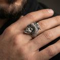 Load image into Gallery viewer, Oxidized geisha skull ring worn on a finger, lifestyle close-up highlighting the sculpted hair bun and skeletal face detail