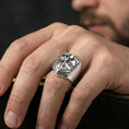 Load image into Gallery viewer, Polished silver finish knight signet ring on the finger, macro lifestyle image highlighting the warrior armor details and sword relief