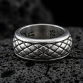 Load image into Gallery viewer, Oxidized sterling silver quilted diamond texture band ring on dark volcanic rock, raised pillow pattern detail, premium macro product shot.