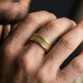 Load image into Gallery viewer, Gold plated beaded dot pattern band worn on finger, detailed bubble texture with rope edge trim, premium lifestyle jewelry photo.
