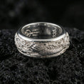 Load image into Gallery viewer, Polished silver koi fish fidget spinner ring on black volcanic stone, crisp koi scale relief with flowing wave pattern, centered close-up studio lighting.