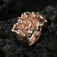 Load image into Gallery viewer, Sterling silver warrior sculpture ring with a rose gold plated finish, dramatic Greek soldier combat design with shield and blade details, close-up on black volcanic rock